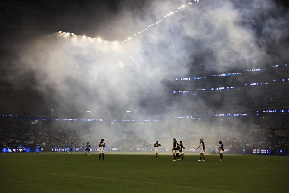 Macarthur FC players prepare for the start of an A-League Men Elimination Final match against Sydney FC in Sydney, May 4, 2024. Three A-League players, believed to be from Macarthur FC, were arrested Friday, May 17, 2024, for alleged betting corruption after police claimed they manipulated the number of yellow cards they received in games last year, Football Australia said. (Mark Evans/AAP Image via AP)