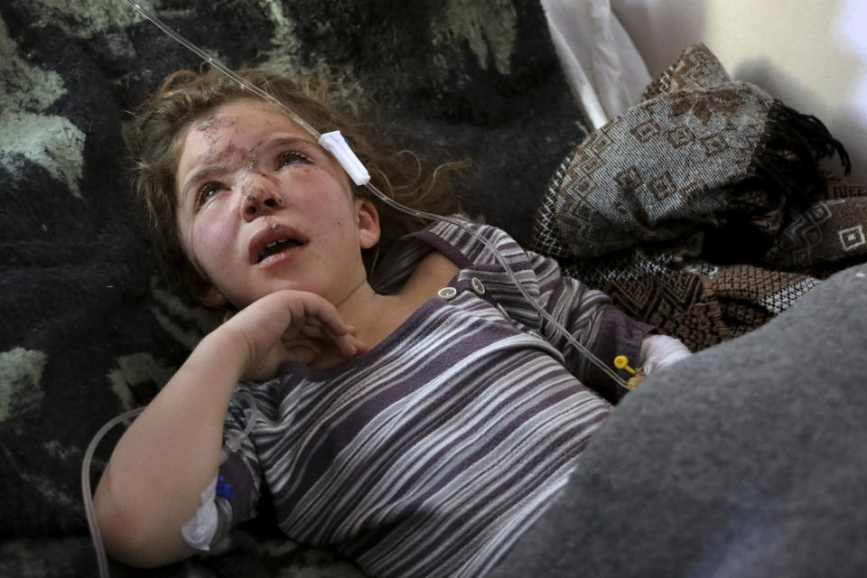 Jana al-Abdo, 7 years-old, who was pulled from under the rubble after a 50-hour rescue operation caused by an earthquake that hit Syria and Turkey, receives treatment at a hospital run by the Syrian American Medical Society near the Bab al-Hawa border crossing with Turkey in the north of Idlib province, Syria, Wednesday, Feb. 8, 2023. . Jana is one of untold numbers of orphans left by Monday's 7.8 magnitude quake. (AP Photo/Omar Albam)