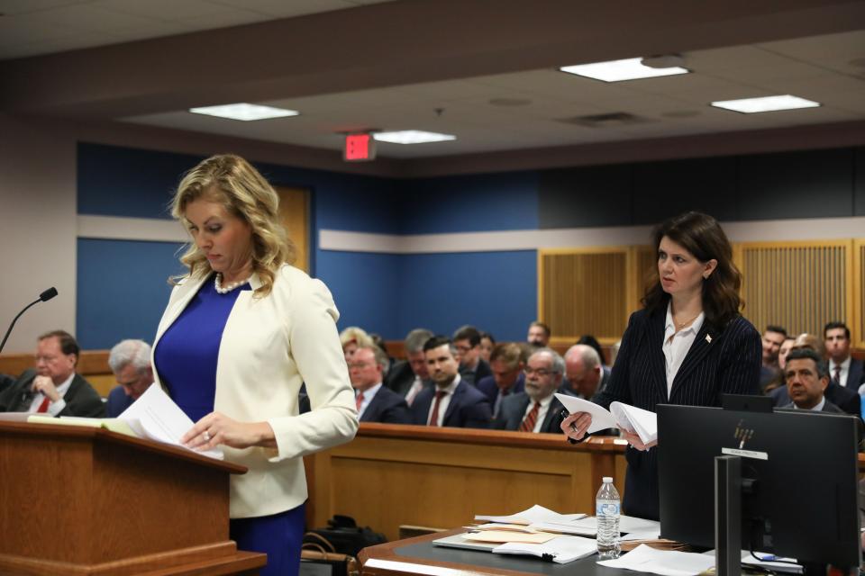 ATLANTA, GA - FEBRUARY 15: Fulton County Special prosecutor Anna Cross (R), who is representing the Fulton County District Attorney's office, speaks next to attorney Ashleigh Merchant, representing Michael Roman, during a hearing in the case of the State of Georgia v. Donald John Trump at the Fulton County Courthouse on February 15, 2024 in Atlanta, Georgia. Judge Scott McAfee is hearing testimony as to whether DA Fanni Willis and Special Prosecutor Nathan Wade should be disqualified from the case for allegedly lying about a personal relationship. (Photo by Alyssa Pointer-Pool/Getty Images)