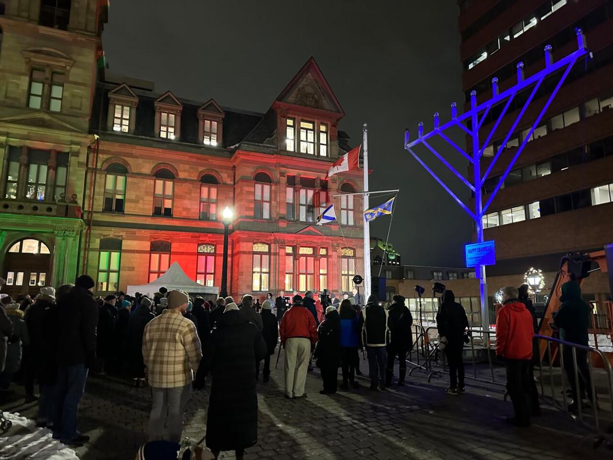 A celebration at the menorah in Grand Parade Square was held on Thursday to mark the start of Hanukkah.  (Luke Ettinger/CBC - image credit)