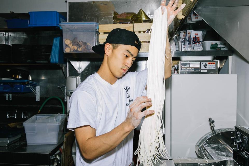 Shinoda checks the noodles.