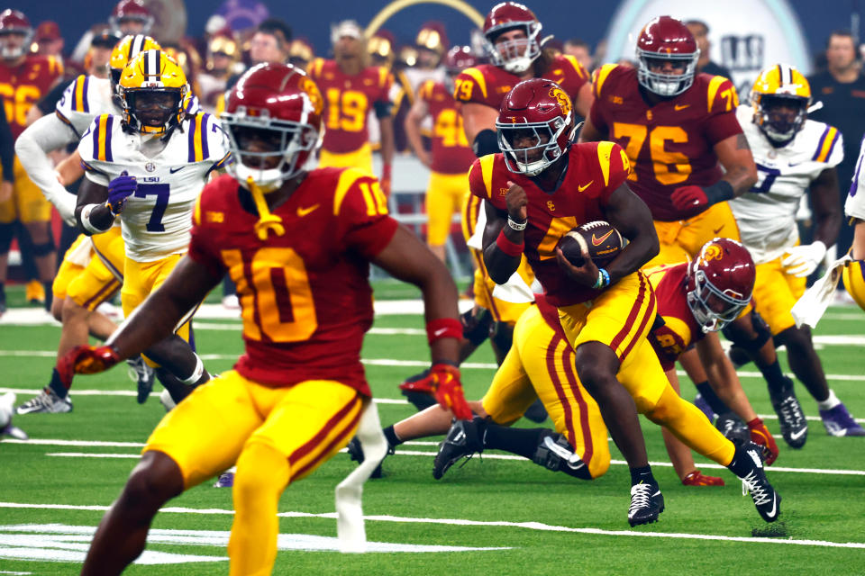 LAS VEGAS, NV - SEPTEMBER 1: Running back Woody Marks (4) of the USC Trojans runs onto the field during the Modelo Vegas Kickoff Classic with the USC Trojans against the LSU Tigers on September 1, 2024 at Allegiant Stadium in Las Vegas, Nevada. (Photo by Jeff Speer/Icon Sportswire via Getty Images)