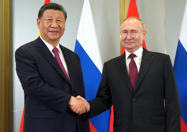 Xi Jinping, left, and Vladimir Putin want to challenge Washington's dominance in global affairs (Pavel Volkov)