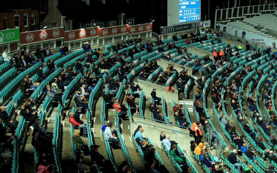 A general view of fans social distancing in the stands during the Vitality T20 Blast match at The Kia Ova - PA