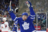 Toronto Maple Leafs forward Michael Bunting celebrates a goal against the Ottawa Senators during first-period NHL hockey game action in Toronto, Saturday, Oct. 16, 2021. (Evan Buhler/The Canadian Press via AP)