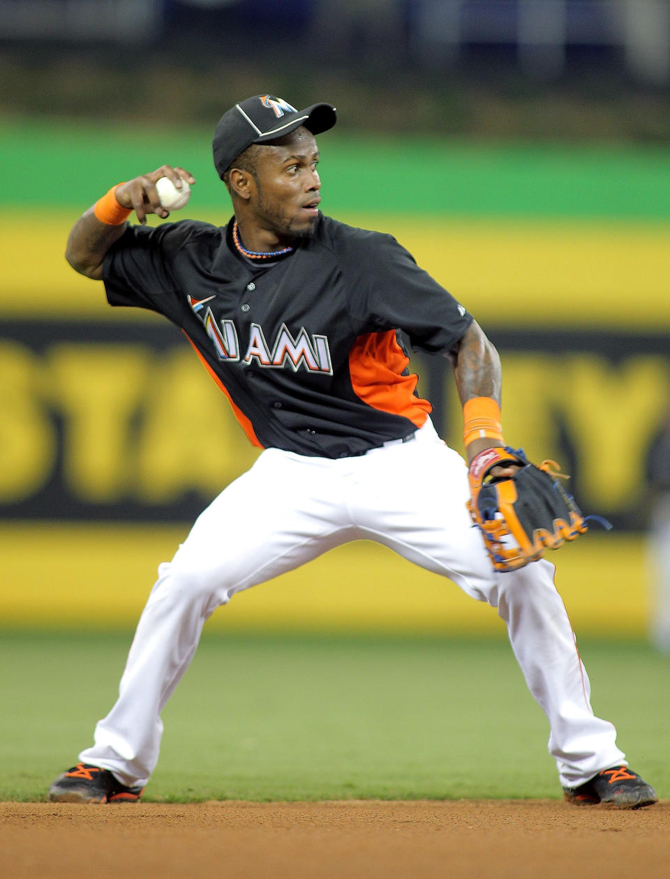 MIAMI, FL - APRIL 13: Shortstop Jose Reyes #7 of the Miami Marlins fields the ball against the Houston Astros at Marlins Park on April 13, 2012 in Miami, Florida. (Photo by Marc Serota/Getty Images)