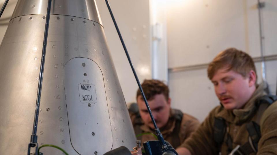 Airmen connect the forward shroud to the aft shroud of the reentry system for the Minuteman III weapon at a launch facility in Colorado on Feb. 12, 2024. (Senior Airman Sarah Post/U.S. Air Force)