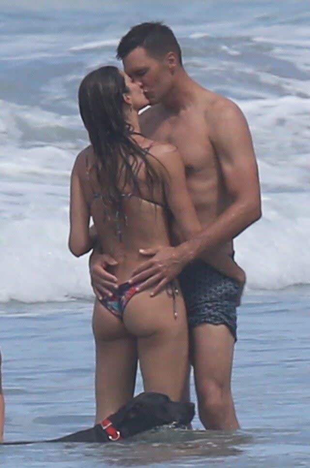 The lovebirds were photographed locking lips in the middle of the ocean during their family vacation to Costa Rica.