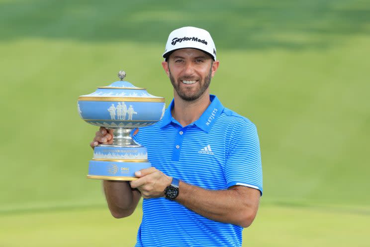 Dustin Johnson has plenty of trophies, and now he can take a little nap. (Getty Images)