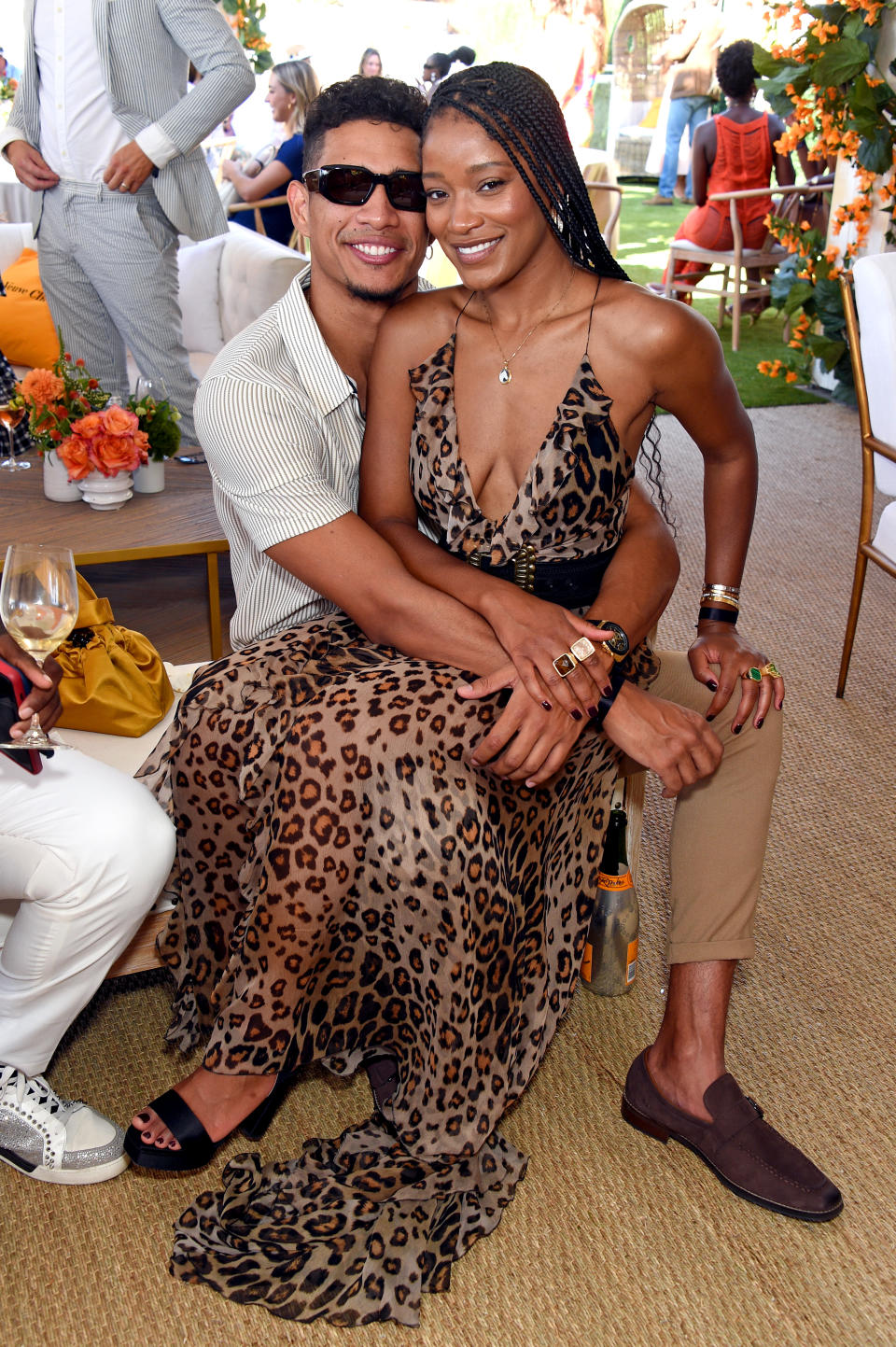 Keke Palmer sitting on Darius Jackson's lap in Pacific Palisades 