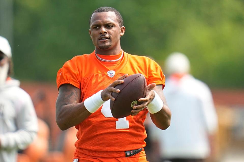 Browns quarterback Deshaun Watson (4) warms up during practice May 24 in Berea.