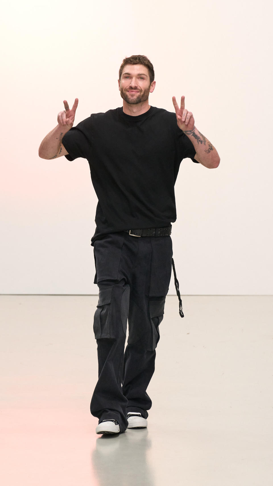 Doni Nahmias at his spring/summer 2023 show in Paris wearing the new Five-O sneaker. - Credit: Courtesy of Nahmias