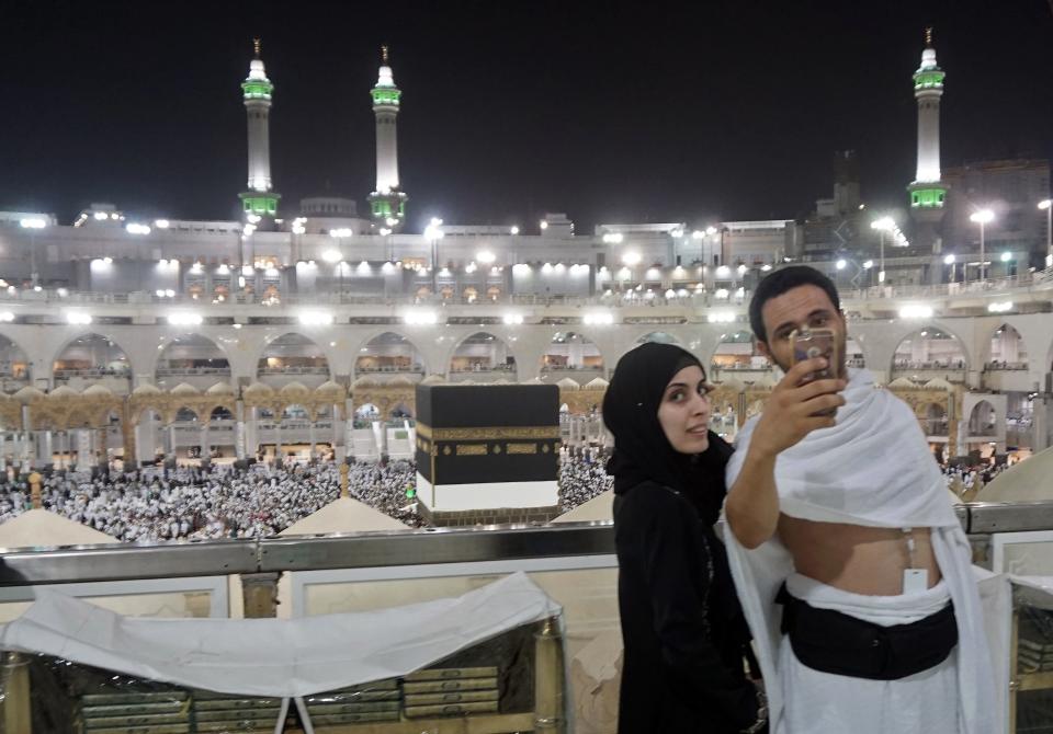 Muslim pilgrims take a selfie at the Grand Mosque in the holy Saudi city of Mecca.