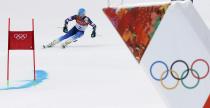 Ted Ligety of the U.S. competes in the first run of the men's alpine skiing giant slalom event in the Sochi 2014 Winter Olympics at the Rosa Khutor Alpine Center February 19, 2014. REUTERS/Mike Segar (RUSSIA - Tags: OLYMPICS SPORT SKIING)