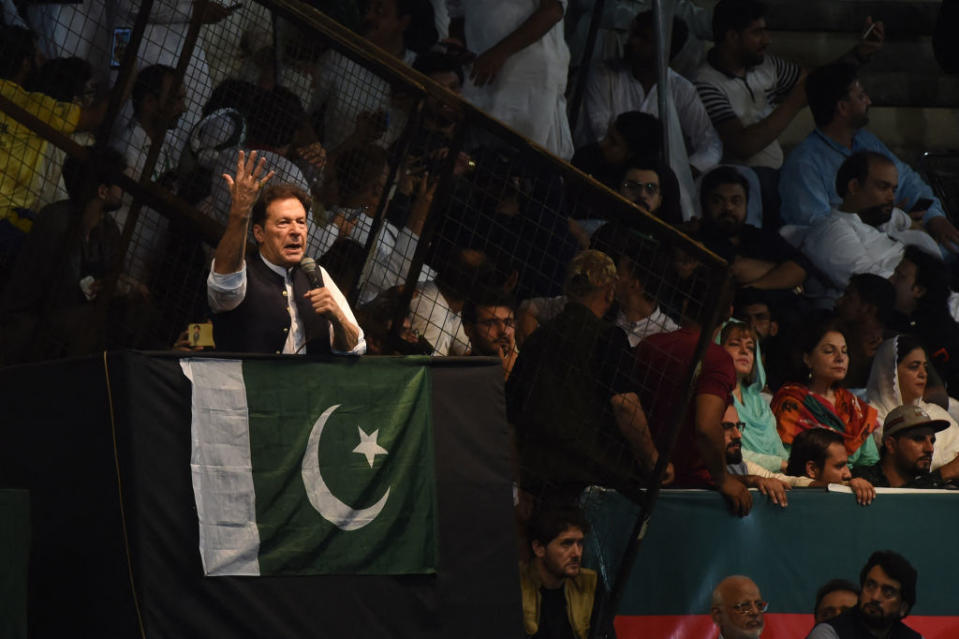 Pakistan's former Prime Minister Imran Khan delivers a speech to his supporters during a rally to celebrate the 75th anniversary of Pakistan's independence day in Lahore on Aug. 13, 2022.<span class="copyright">Arif Ali—AFP via Getty Images</span>