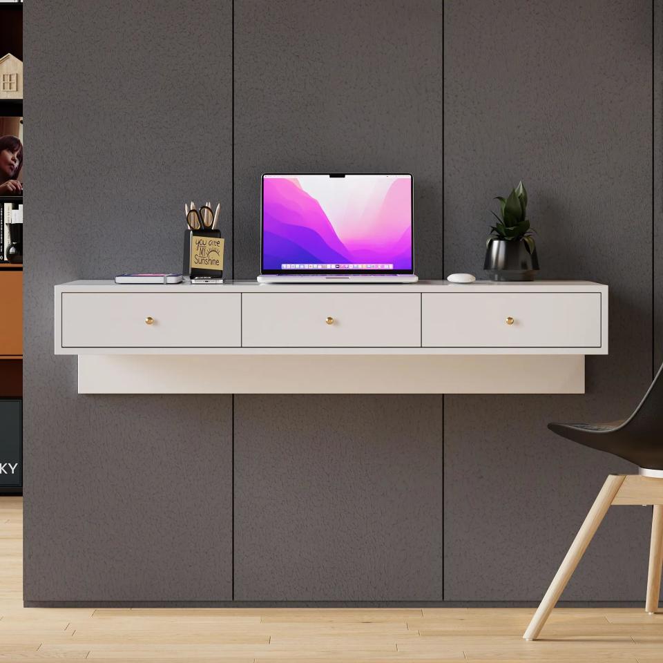 <p><a href="https://go.redirectingat.com?id=74968X1596630&url=https%3A%2F%2Fwww.homary.com%2Fitem%2Fmodern-white-floating-desk-with-drawers-wall-mounted-desk-in-pine-wood-frame-14418.html&sref=https%3A%2F%2Fwww.housebeautiful.com%2Fshopping%2Ffurniture%2Fg22802052%2Ffloating-wall-mounted-desks%2F" rel="nofollow noopener" target="_blank" data-ylk="slk:Shop Now;elm:context_link;itc:0;sec:content-canvas" class="link ">Shop Now</a></p><p>Modern White Floating Desk </p><p>homary.com</p><p>$379.99</p>