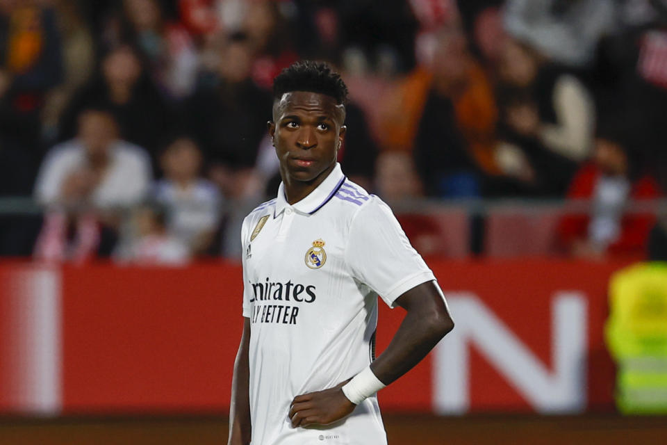 Real Madrid's Vinicius Junior reacts after Girona's Taty Castellanos scoring his side's third goal during a Spanish La Liga soccer match between Girona and Real Madrid, at the Montilivi stadium in Girona, Spain, Tuesday, April 25, 2023. (AP Photo/Joan Monfort)