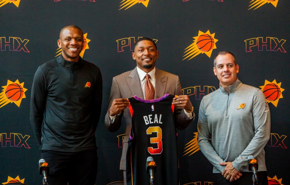 James Jones (left), Bradley Beal and Frank Vogel pose for a photo after a news conference officially introducing Beal to the Phoenix Suns team at Footprint Center in Phoenix on June 29, 2023.