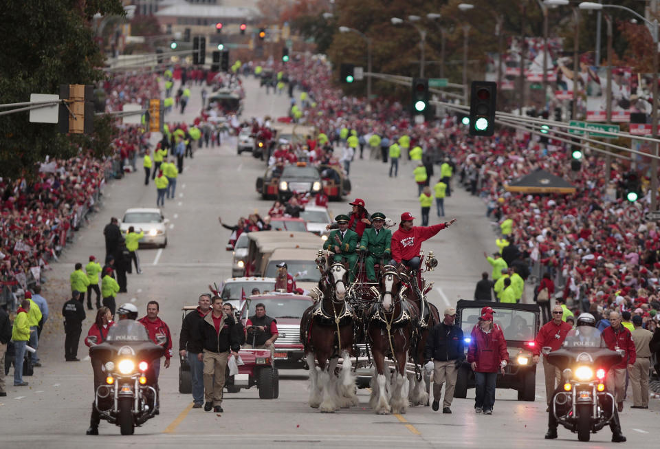 ST. LOUIS, MO - OCTOBER 30: Manager Tony La Russa of the St. Louis Cardinals rides with the Budweiser Clydesdales during a parade celebrating the team's 11th World Series championship October 30, 2011 in St. Louis, Missouri. (Photo by Whitney Curtis/Getty Images)