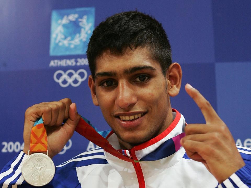 Khan celebrating his silver-medal win for Team GB at Athens 2004 (Getty Images)