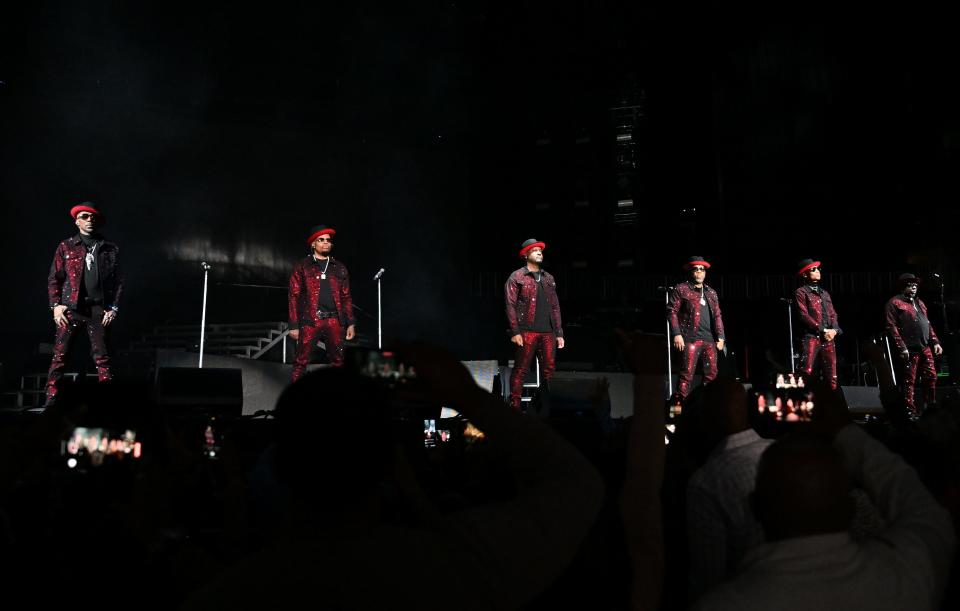 Ralph Tresvant, Ricky Bell, Johnny Gill, Michael Bivins, Ronnie DeVoe, and Bobby Brown of New Edition perform onstage during 2023 New Edition Legacy Tour at State Farm Arena on March 30, 2023 in Atlanta, Georgia