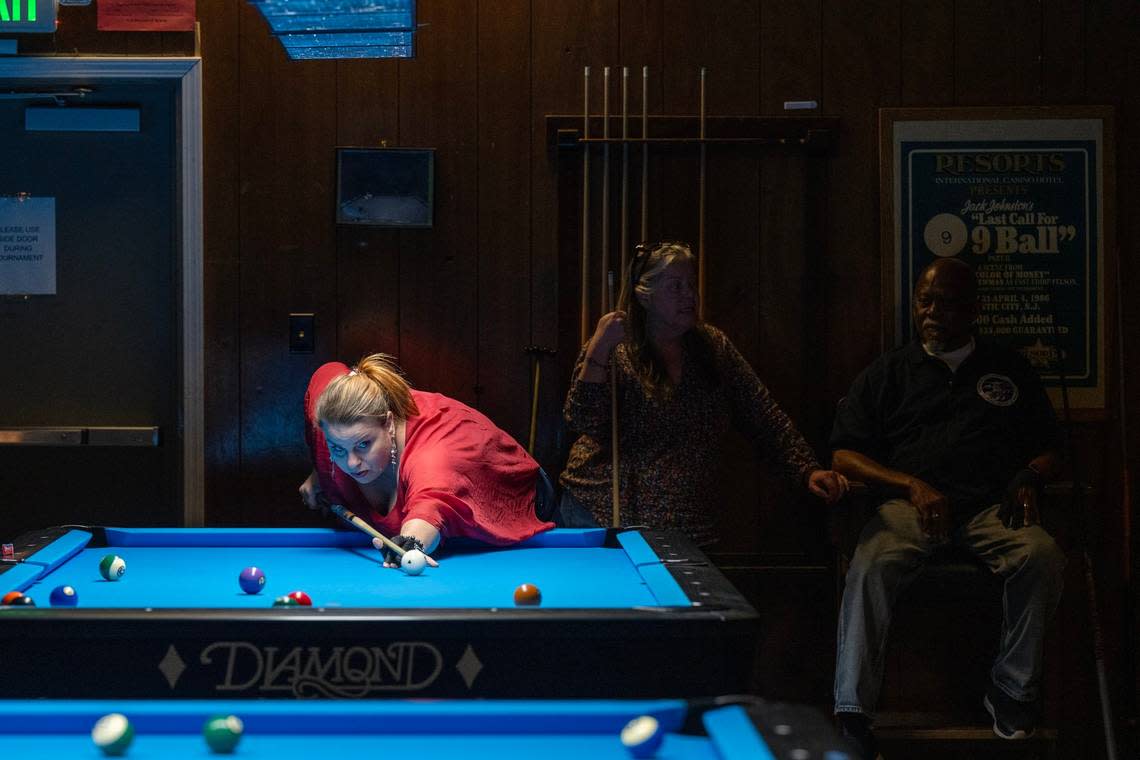 Audrey Amundsen lines up a shot on Thursday at Jointed Cue Billiards, a neighborhood pool hall in Hollywood Park.