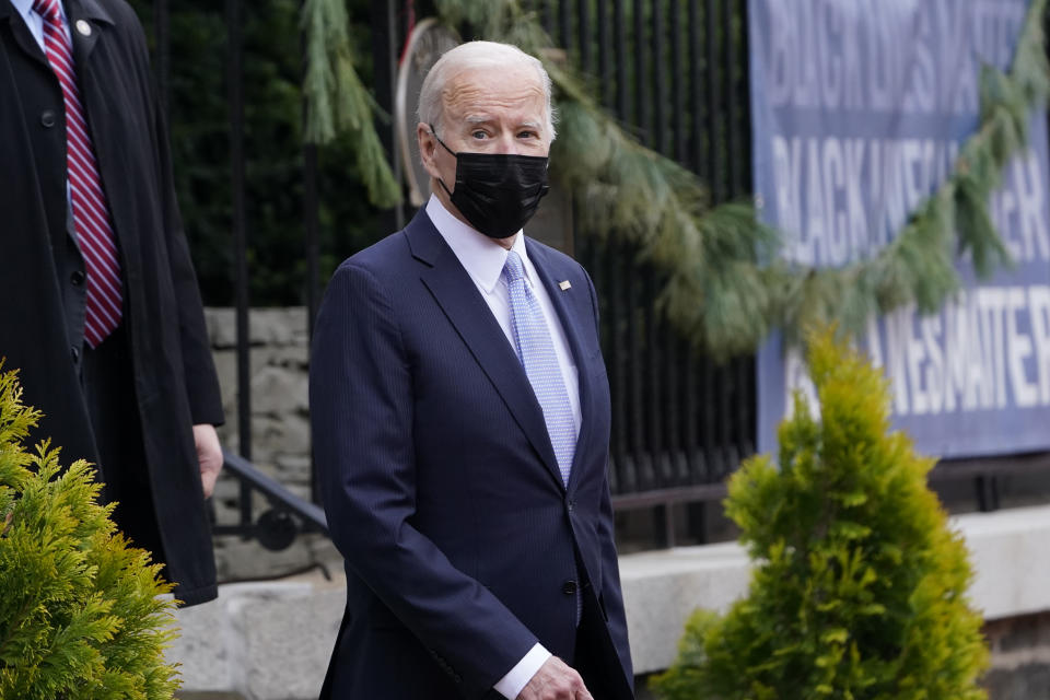 President Joe Biden walks out of Holy Trinity Catholic Church in Washington, Wednesday morning, Dec. 8, 2021. (AP Photo/Susan Walsh)