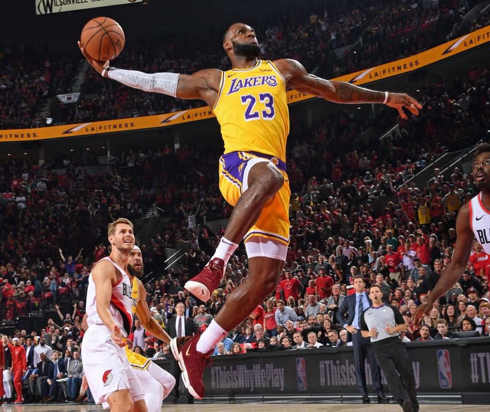 LeBron James took little time making his presence in purple and gold felt. (Getty)
