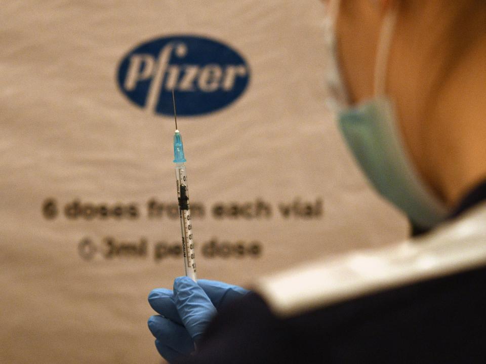 <p>Pfizer seeks full approval for its Covid-19 vaccine from the FDA</p> (AFP via Getty Images)