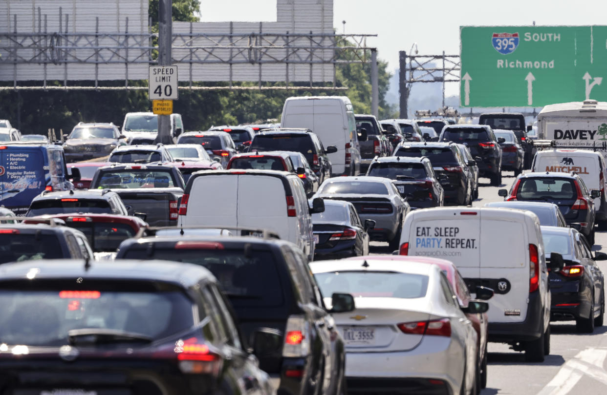 Motorists drive in traffic on Interstate 395 on June 30, 2022 in Washington, DC ahead of Fourth of July holiday weekend. (Photo by Kevin Dietsch/Getty Images)