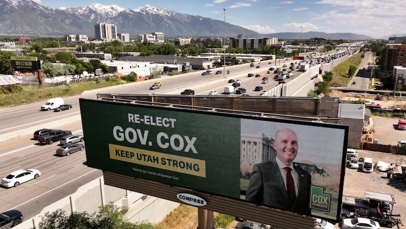 A campaign billboard for Gov. Spencer Cox on I-15 in Salt Lake County on Thursday, June 6, 2024.