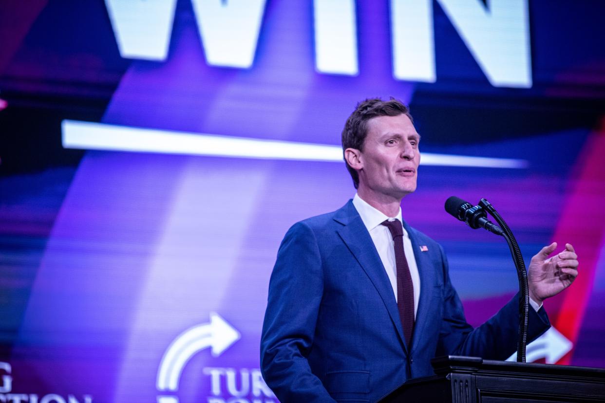 Blake Masters, Republican candidate for U.S. Senate, speaks on stage at the Unite and Win Rally organized by Turning Point Action in Phoenix on Aug. 14, 2022.