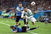 <p>Portugal talisman Cristiano Ronaldo is brought down to earth by Martin Caceres </p>