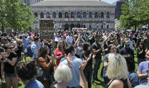 Wayfair employees and supporters rally at Copley Square in Boston, Wednesday, June 26, 2019. Employees at online home furnishings retailer Wayfair walked out of work to protest the company's decision to sell $200,000 worth of furniture to a government contractor that runs a detention center for migrant children in Texas. (AP Photo/Charles Krupa)