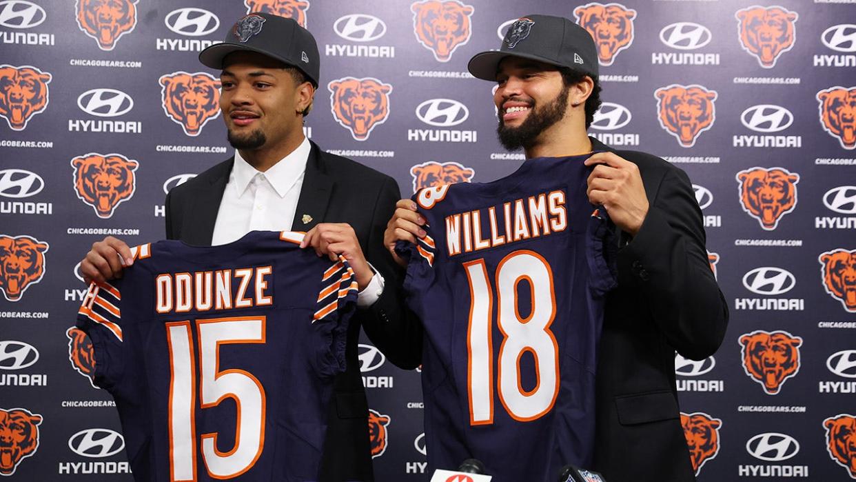 <div>Rome Odunze and Caleb Williams pose for a photo during their introductory press conference at Halas Hall on April 26, 2024 in Lake Forest, Illinois. (Photo by Michael Reaves/Getty Images)</div>