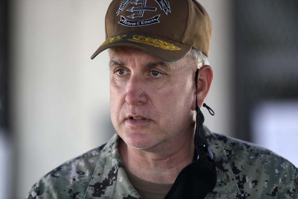Rear Adm. Philip Sobeck, commander of Expeditionary Strike Group 3, speaks during a news conference Monday, July 13, 2020, in San Diego. Fire crews continue to battle the blaze Monday after numerous people suffered minor injuries in an explosion and fire Sunday on board the USS Bonhomme Richard at Naval Base San Diego. (AP Photo/Gregory Bull)