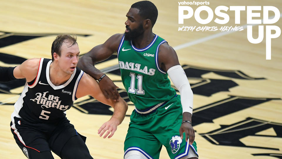 Los Angeles Clippers G Luke Kennard & Dallas Mavericks G Tim Hardaway Jr. square off during Sunday's 124-73 Dallas victory. (Photo by John McCoy/Getty Images)