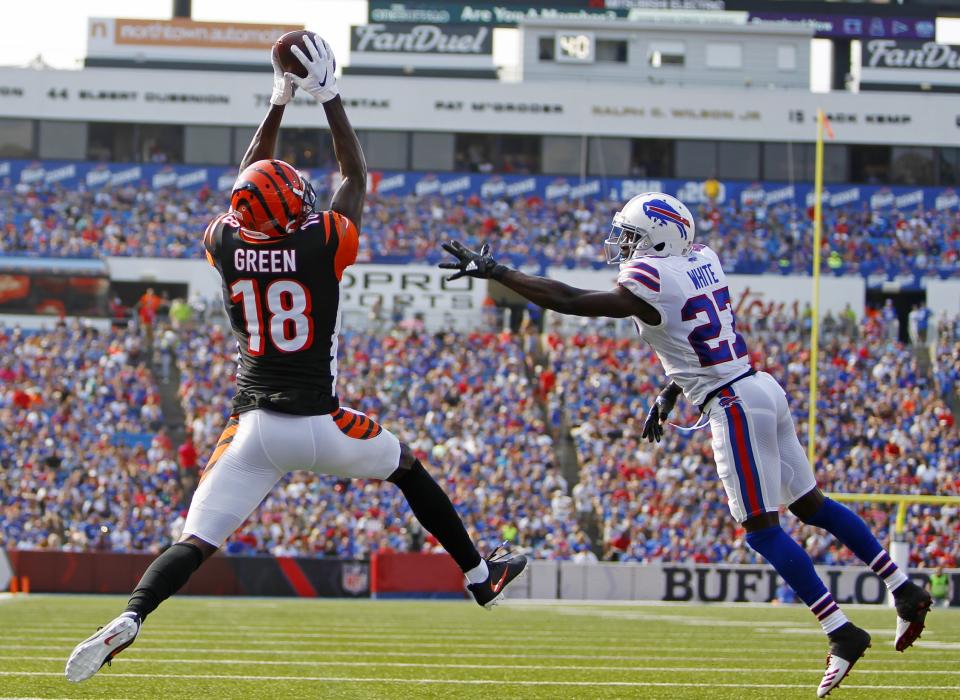 Cincinnati Bengals wide receiver A.J. Green (18) catches a pass for a touchdown in front of Buffalo Bills' Tre'Davious White (27) during the first half of a preseason NFL football game Sunday, Aug. 26, 2018, in Orchard Park, N.Y. (AP Photo/Jeffrey T. Barnes)