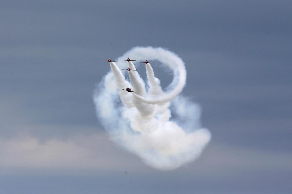 The Royal Air Force aerobatic team, the Red Arrows, perform during The Royal International Air Tattoo at the RAF in Fairford