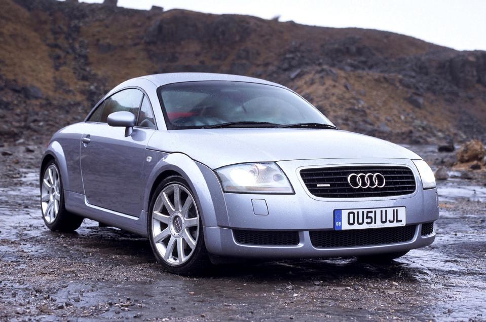 <p><span><span>It did not matter that the first Audi TT was based on the humble Mk4 Volkswagen Golf platform - here was a car that outdid rivals from BMW, Mercedes and </span><strong><span>Porsche</span></strong><span> in the style stakes. Waiting lists were long for the first TT coupe, which went on sale in late 1998. Even a recall for an optional rear spoiler to be added, which solved a potential high speed </span><strong><span>instability</span></strong><span> concern, could not dampen buyers’ enthusiasm.</span></span></p><p><br><span><span>Four-wheel drive was standard on the </span><strong><span>225bhp</span></strong><span> models and an option with the 180bhp version. A 3.2-litre V6 arrived in 2003, but a 225 Coupe is the one to have as the first TT becomes collectible.</span></span></p>