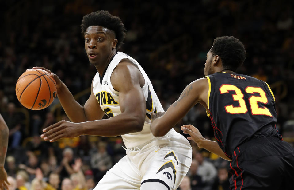 Iowa forward Tyler Cook delivered a crushing blow to PSU defender Shep Garner. (AP file photo)