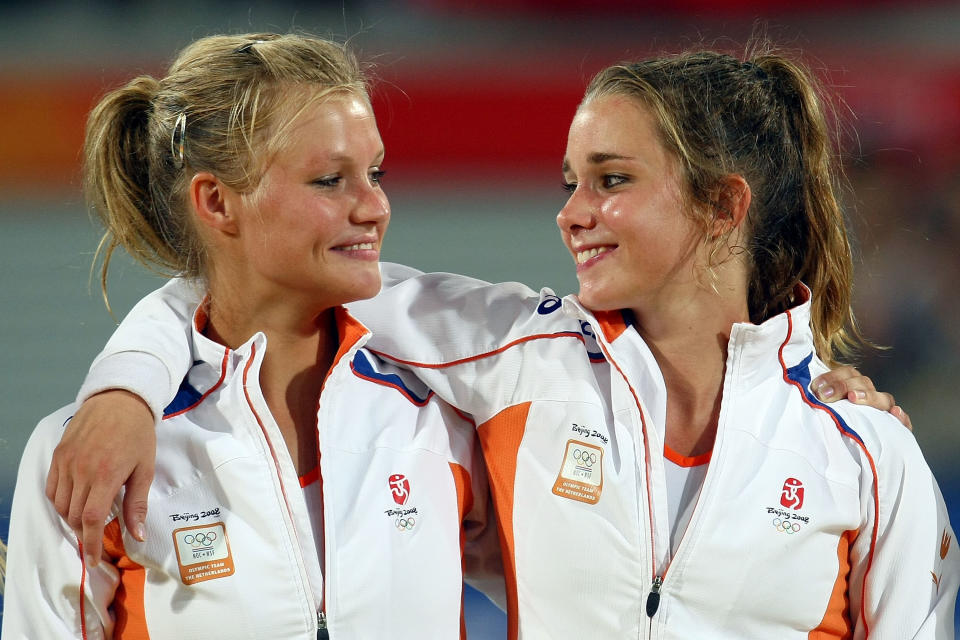 BEIJING - AUGUST 22: Sophie Polkamp (L) and Ellen Hoog of the Netherland pose with their gold medal in the women's hockey at the Olympic Green Hockey Field on Day 14 of the Beijing 2008 Olympic Games on August 22, 2008 in Beijing, China. (Photo by Lars Baron/Bongarts/Getty Images)