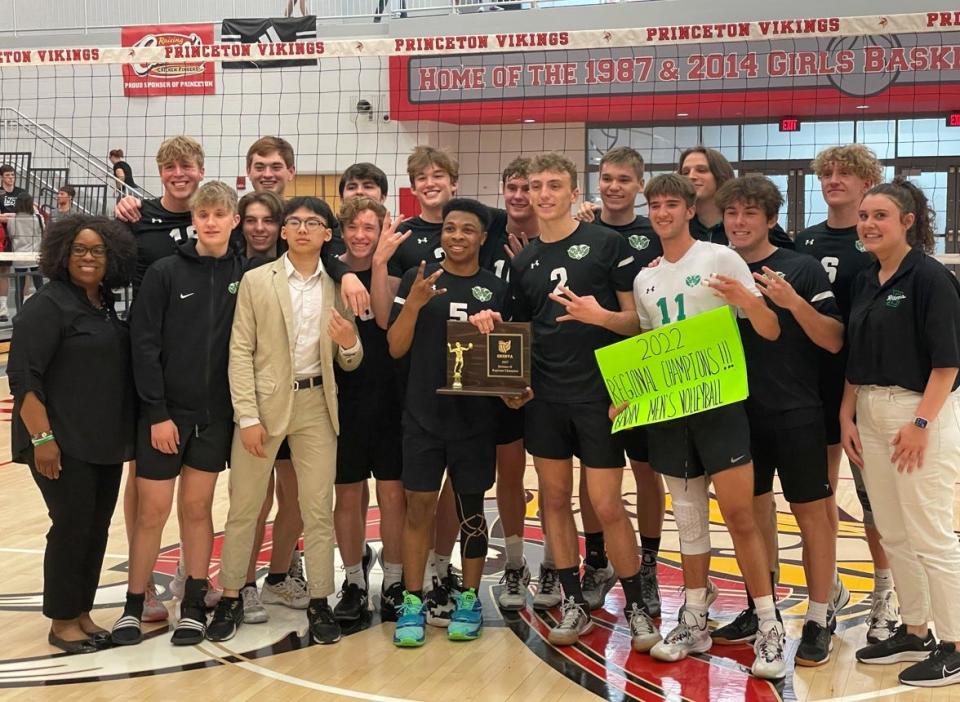 The Badin boys volleyball team celebrates their Division II south region title.
