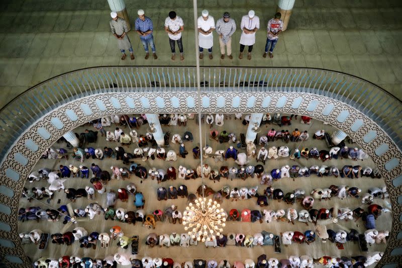 FILE PHOTO: Muslims attend Friday prayers at the Baitul Mukarram National Mosque amid concerns about the spread of coronavirus disease (COVID-19) in Dhaka