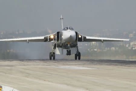 A Sukhoi Su-24 fighter jet lands at the Hmeymim air base near Latakia, Syria, in this handout photograph released by Russia's Defence Ministry November 7, 2015. REUTERS/Ministry of Defence of the Russian Federation/Handout via Reuters