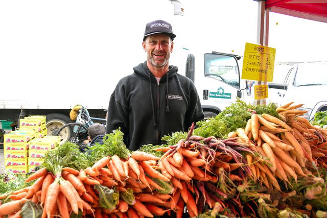 <p>Foodwise</p> Dirty Girl Produce owner Joe Schirmer at the Ferry Plaza Farmers Market in San Francisco