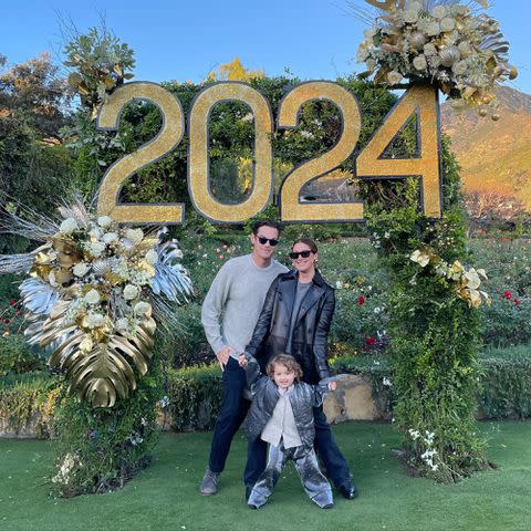 <p>Ashley Tisdale Instagram</p> Ashley Tisdale, Christopher French and their daughter Jupiter ring in the New Year on Jan. 1, 2024.