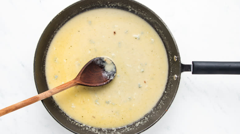 Cheese sauce in frying pan