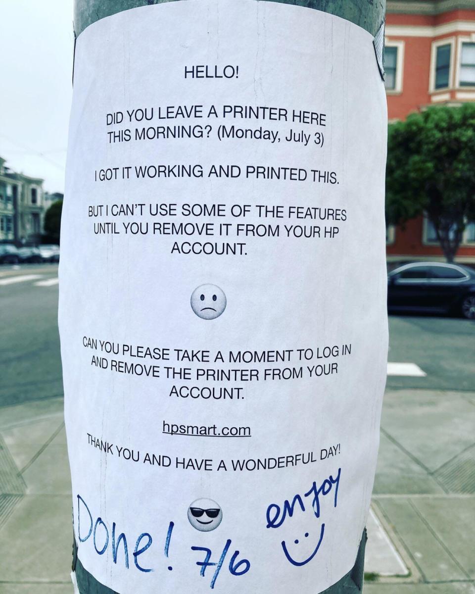 A note on a street pole asking whoever left a free printer there to remove it from their account because they got it to work (and printed the note) but can't use all the features, with "thank you, have a wonderful day," and someone writes "Done! Enjoy"