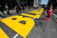 Newly painted "Black Lives Matter" mural along 5th Avenue outside Trump Tower in New York City